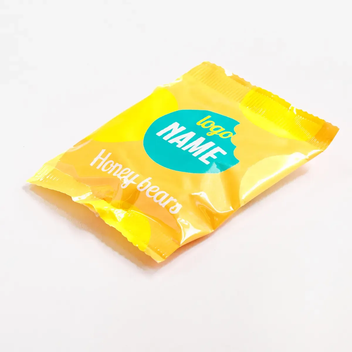 Fruitgums met honingsmaak in bedrukt zakje