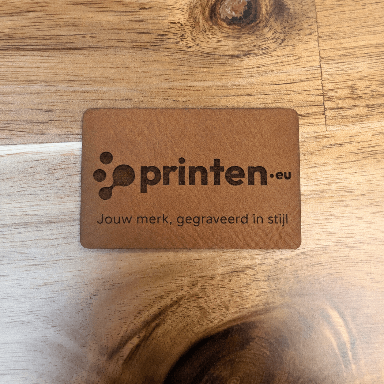 Gegraveerde patches van kunstleer of kurk